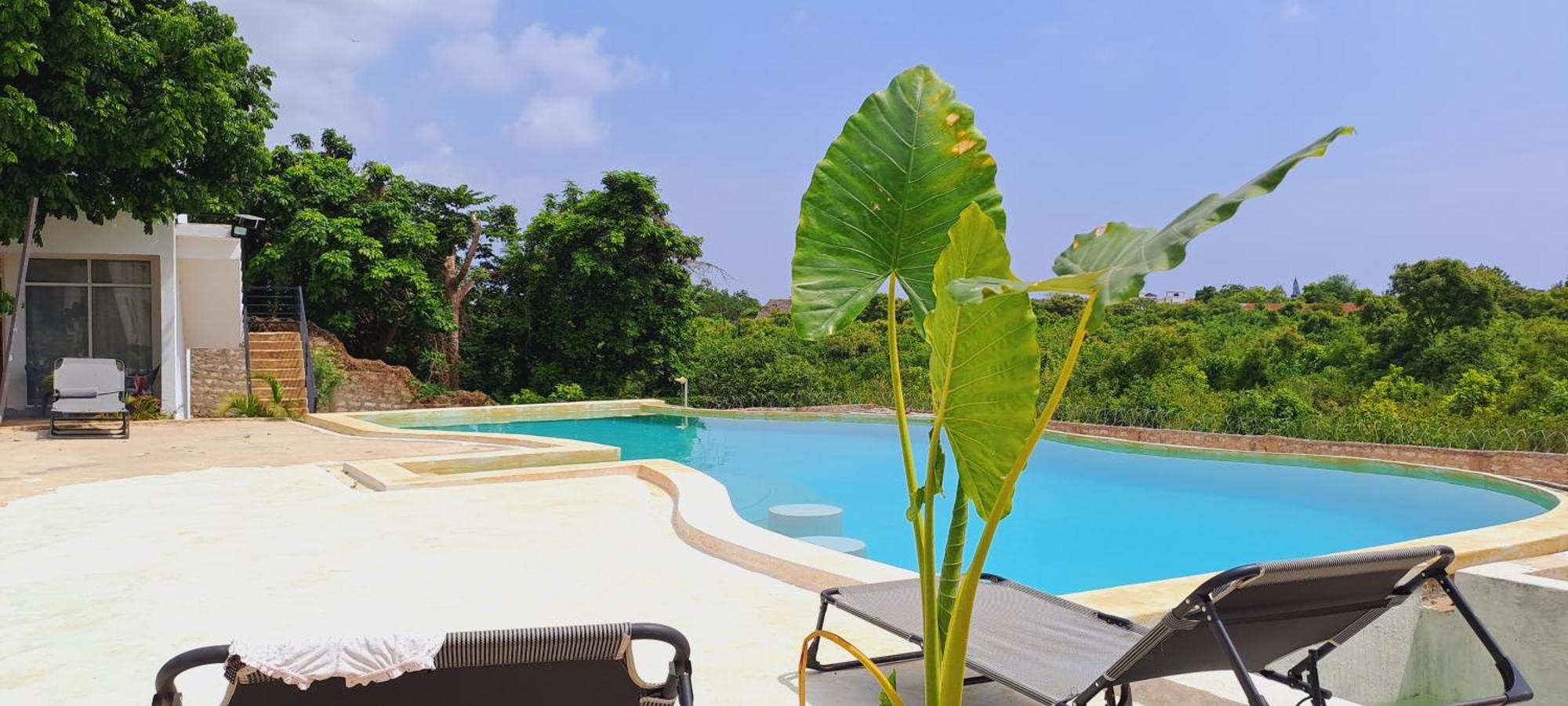 Cave Diani Holiday Apartments Diani Beach Exteriör bild